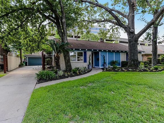 Well manicured landscaping with mature trees, and newly painted exterior.  Beautiful curb appeal for a great home, that has been