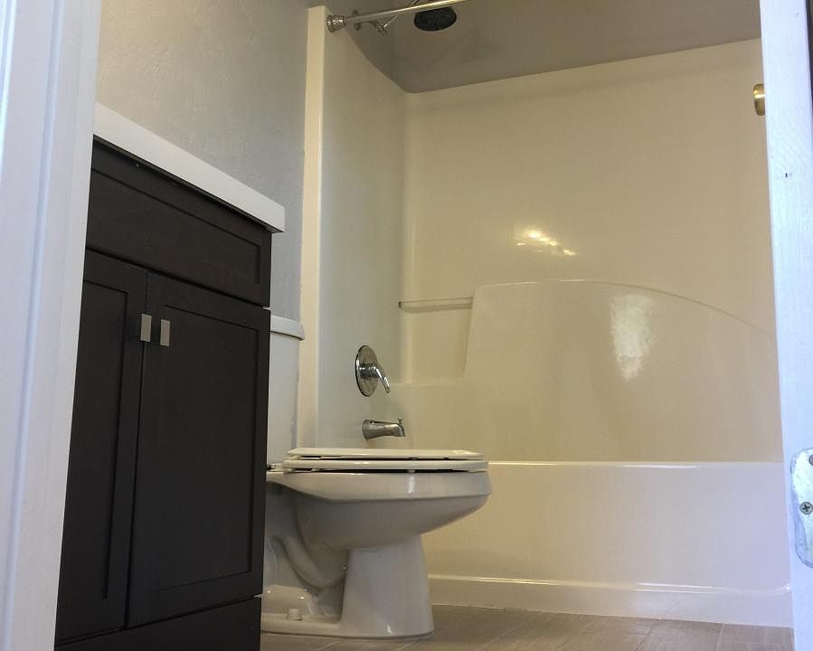 Bathroom for bedroom 1, new floor and new sink top