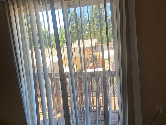 Blinds, patio door to balcony