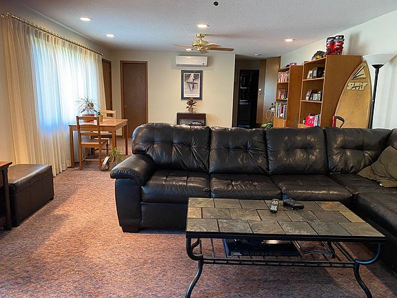 Enough room for living/family room furniture, table & chairs and more!