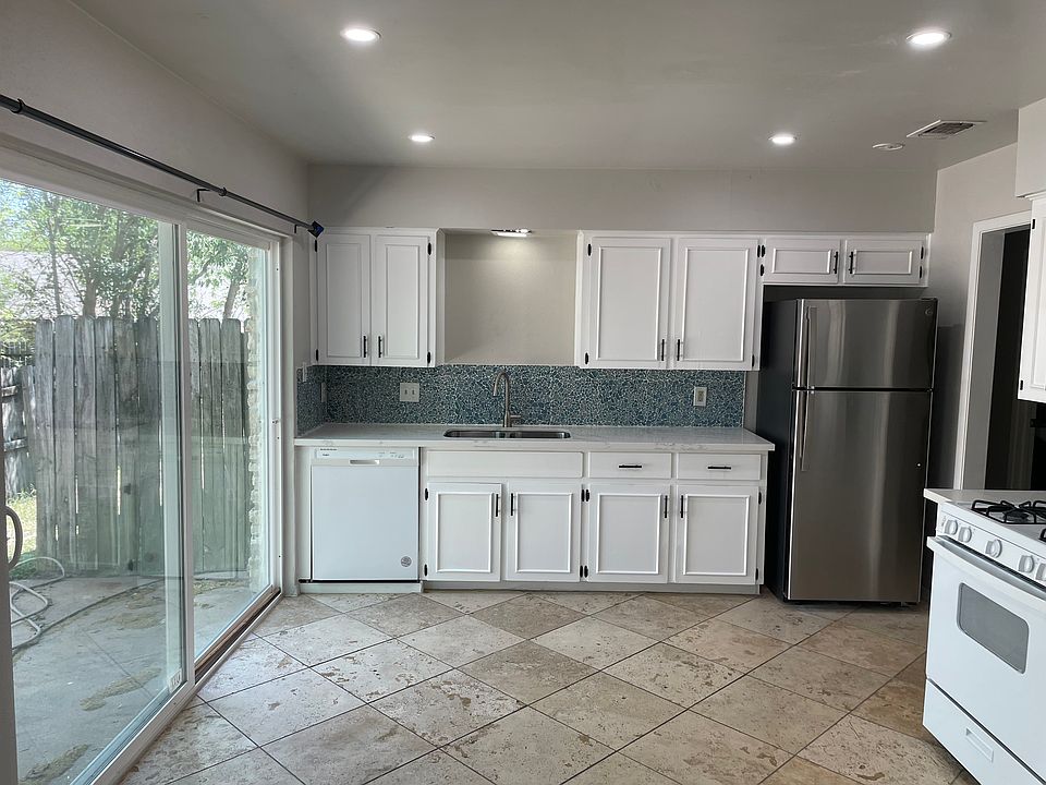 New sliding doors. Renovated Kitchen. New Fridge.