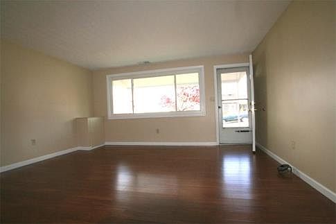 Triple windows overlook front yard