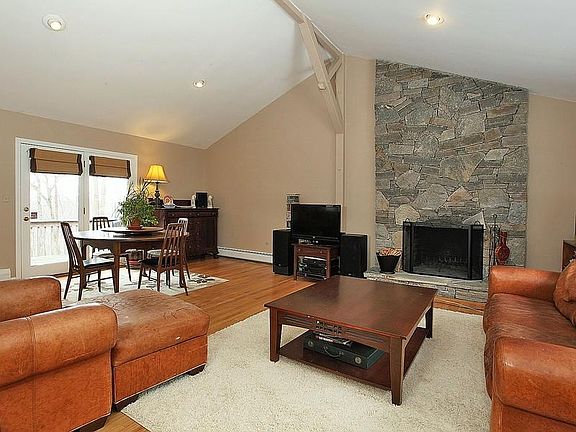 Great room with magnificent stone
        fireplace
