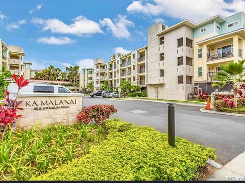 Outside Building view. Unit is located top right hand corner mint green location.