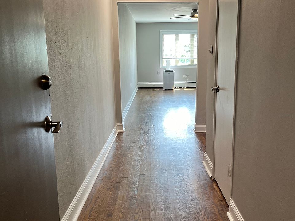 Walking in the front door notice hardwood floors and natural light.