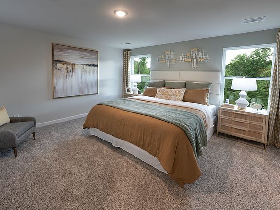 The Lennon floorplan modeled at Village at White Pine.