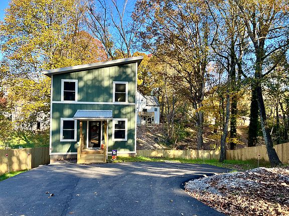 Brand new build in West Asheville with all new stainless steel appliances, hardwood floors, and gorgeous exposed beam ceiling