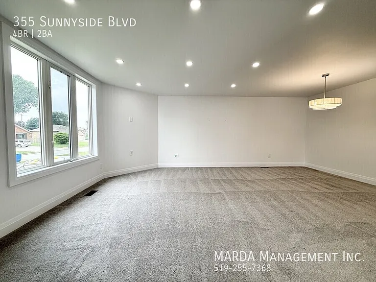 355 Sunnyside Blvd — Photo 4