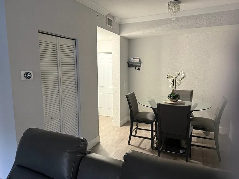 Large dining area by entry accommodates 42" table.
