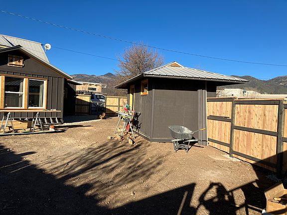 Fully fenced yard,with storage shed