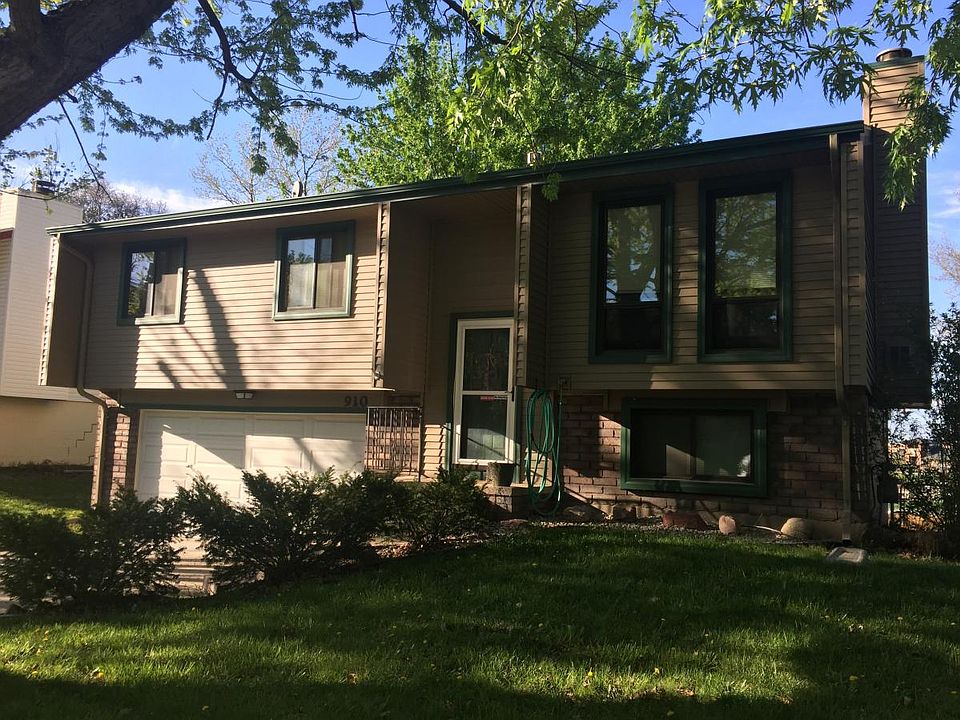 Street view of house, trees in the front provide great shade