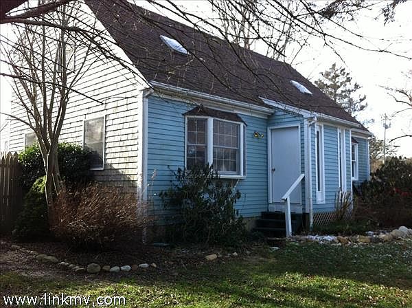 two story duplex with private garden/deck area