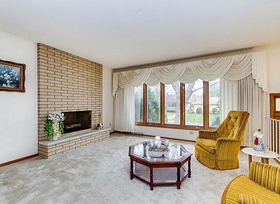 Large living room with a brick fireplace(never used).
