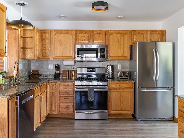 Updated kitchen with quartz counters and new appliances