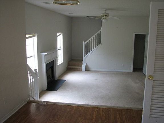 Family room is large, open and has a back staircase to the upstairs bedrooms
