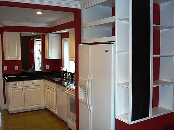 Kitchen view with Built in shelving and black board