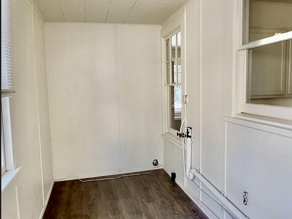 Sunroom for storage or extra space. Access to basement storage area