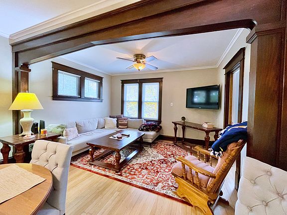 Spacious living room, perfect for watching TV, playing cards, or enjoying quality time with family.