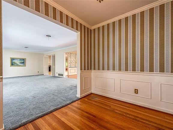 View from front door with spacious foyer and wood floors