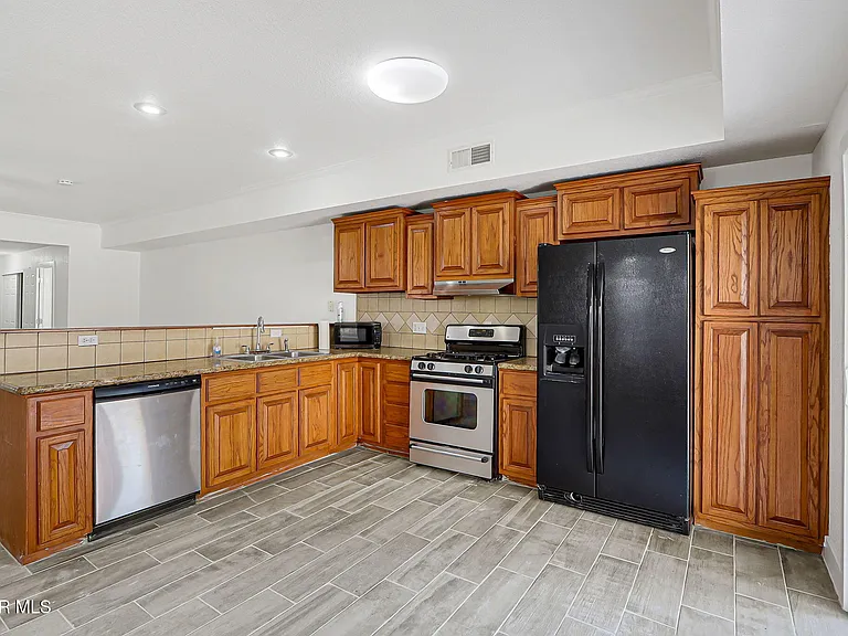 7235 Royal Arms Dr #E — Photo 12