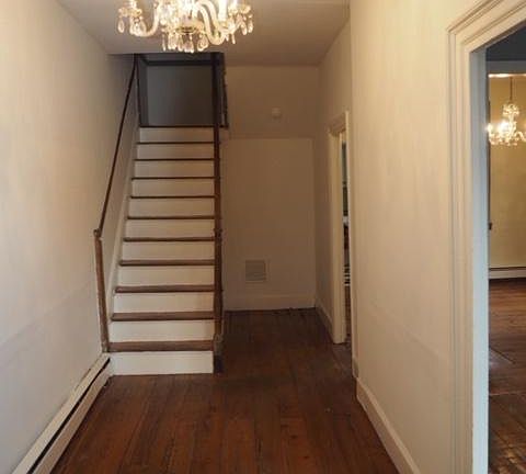 Stairs to second floor and foyer