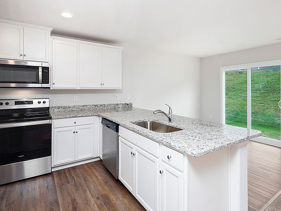 White cabinetry with hardware
