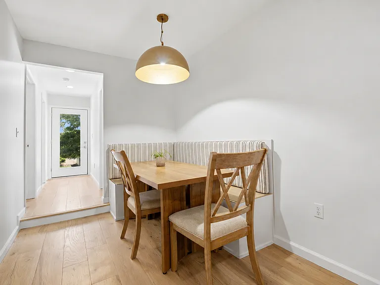 Dining area with custom banquette seating.
