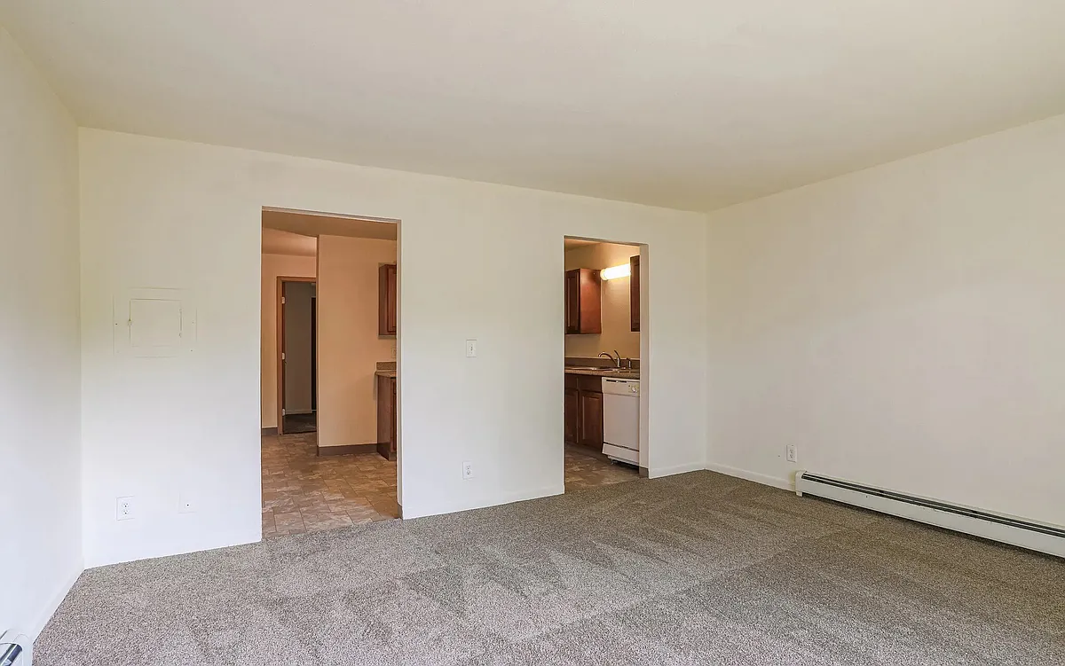 Living area looking into kitchen. - Southview Apartments
