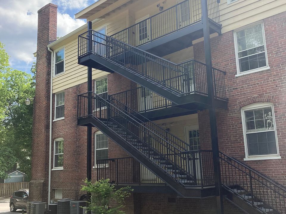 Top floor unit, fire escape / back door. Two parking spaces