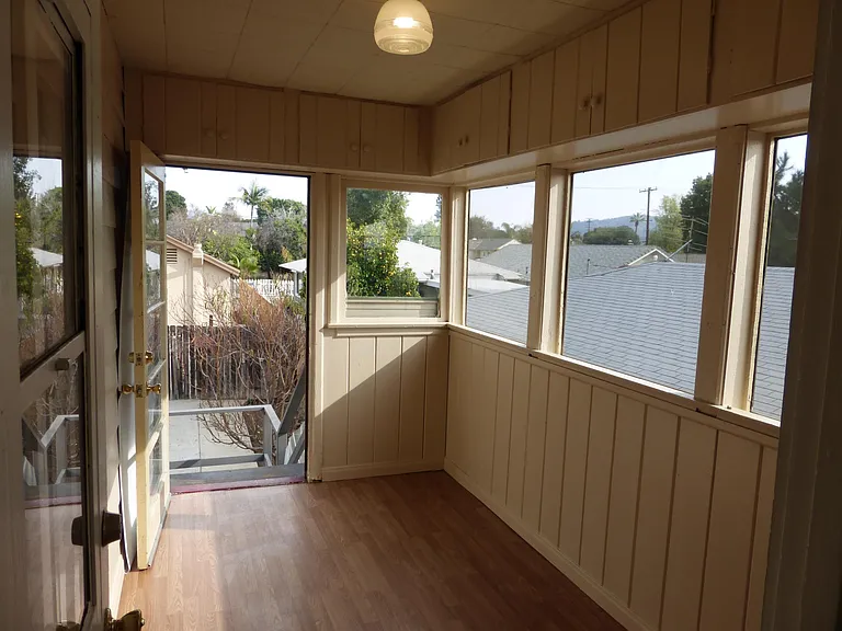 Enclosed front terrace, perfect for morning coffee