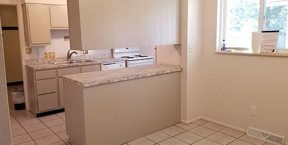 Across dining area towards kitchen (in progress)