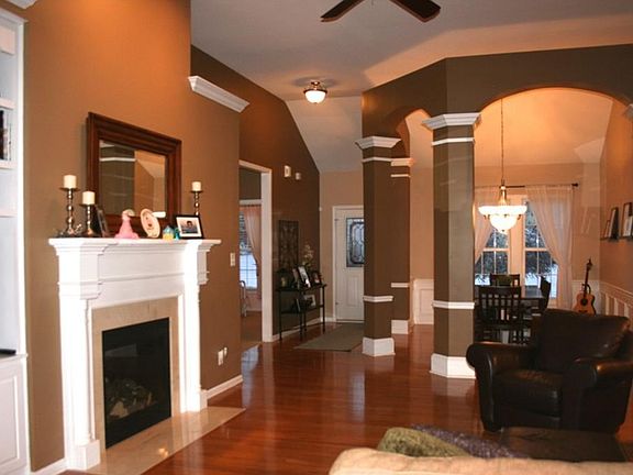 Gleaming hardwood floors, gas fireplace, built-in bookcase.