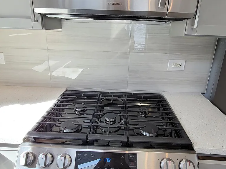 brand new microwave and gas range