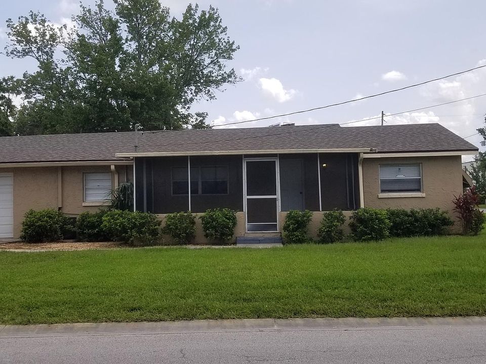 Front of home, carport, garage and screened in porch also a new roof