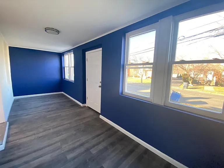 Full porch with plenty of windows and main entrance, new laminate floors, LED lights. 21 x 7