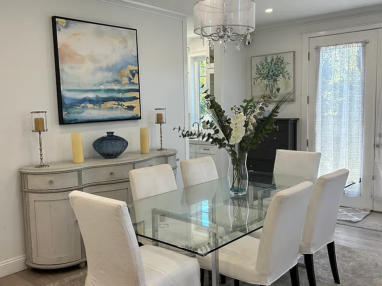 Formal dining area adjacent to living room