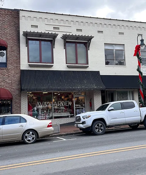 Located in the center of Main Street, across the street from Mast General Store