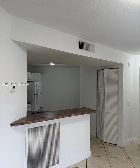 8781 Wiles Rd #103 — Photo 9