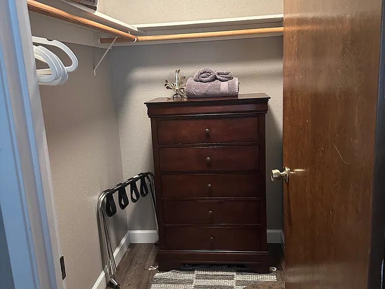 walk-in closet with hangers; 5-drawer chest; clothes hamper... (a washer/dryer is on-site)