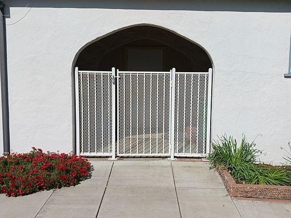Enclosed breezeway between house and garage.