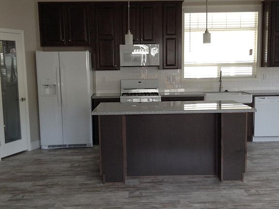 Open spaced Kitchen with walking pantry, farmhouse sink