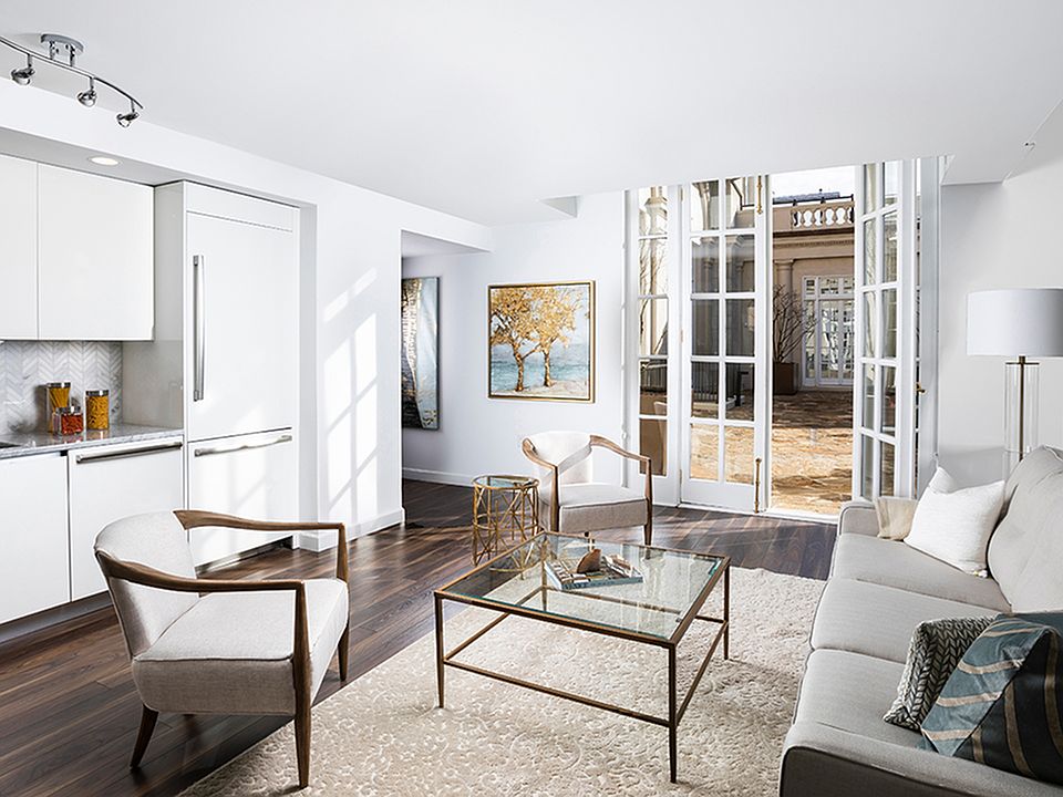 Open concept living areas and kitchens with fully-appointed appliances