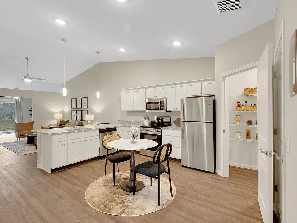 Granite Counters with Stainless Steel Fixtures and Appliances