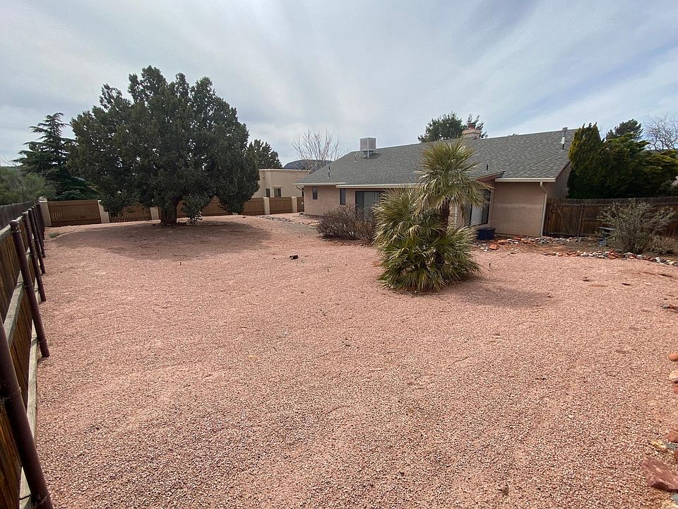 House view from the backyard, with Bell Rock formations behind the photographer.