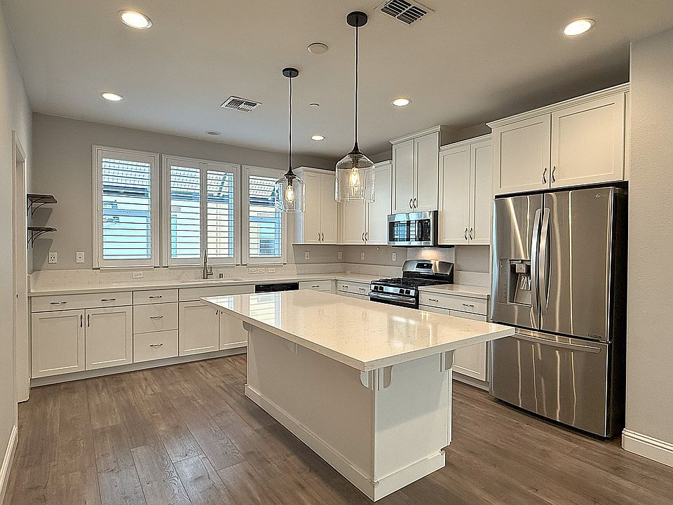 Kitchen with Center Island and Bar Seating