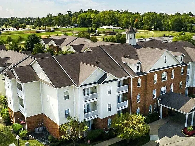 Sleek lines and lush surroundings come into focus from above. This corner view captures the calm, connected feel of the community.