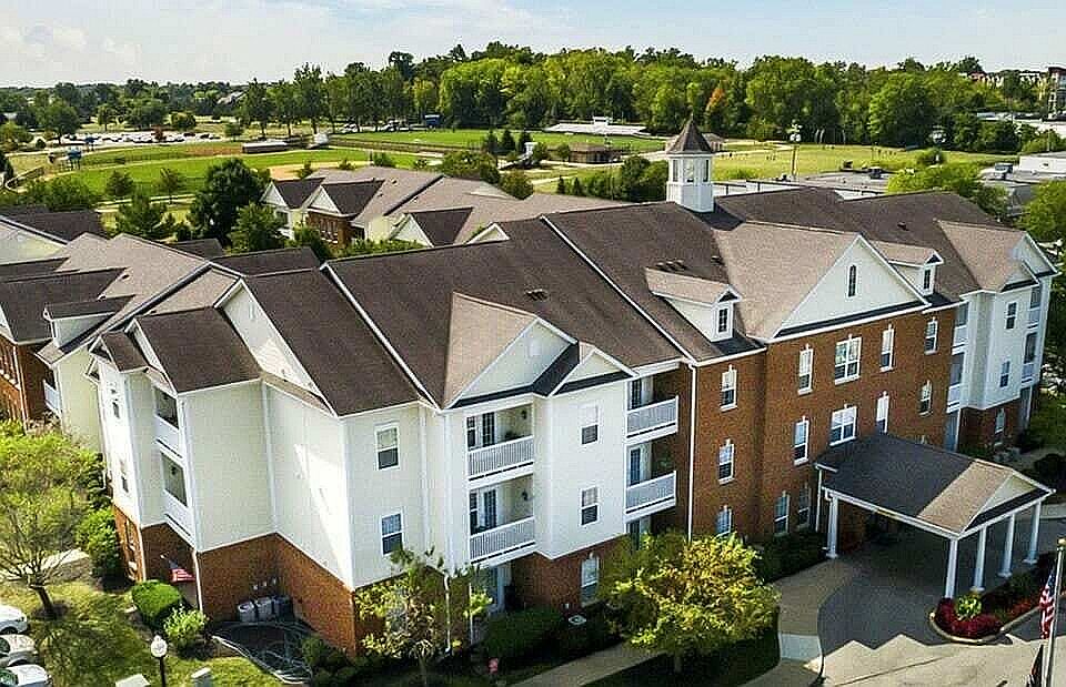 Sleek lines and lush surroundings come into focus from above. This corner view captures the calm, connected feel of the community.
