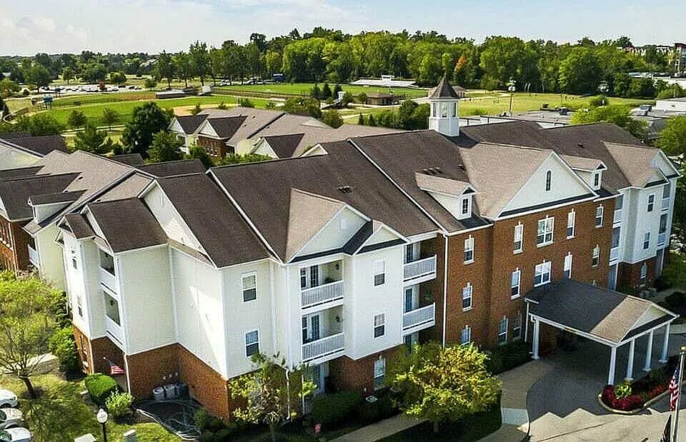 Sleek lines and lush surroundings come into focus from above. This corner view captures the calm, connected feel of the community.