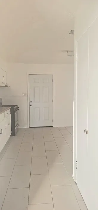 Entry to Kitchen with Pantry