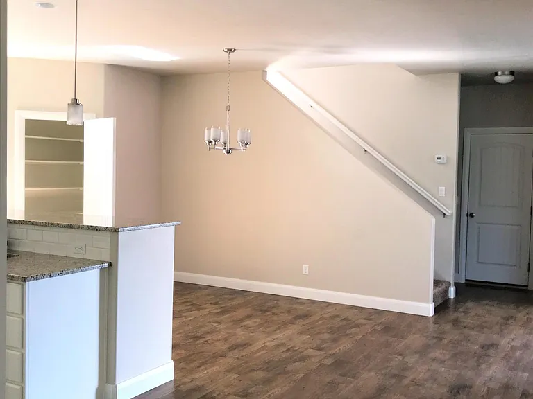 Entryway leading into Kitchen and Dining Room